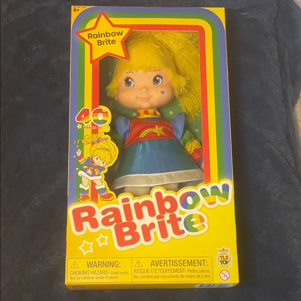 12inch Rainbow Brite Doll with Blue and Red Outfit. NEW. NEVER OPENED.